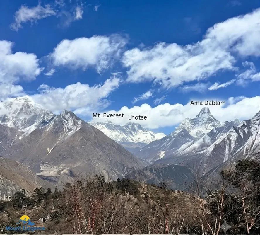 Panoramic mountain view from Shangboche Hill above Namche Bazaar, showing Everest, Lhotse, and Ama Dablam.