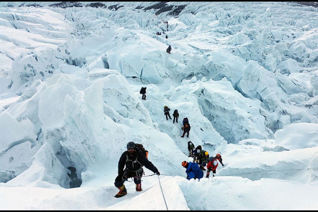 Climbers and their Sherpas in the Khumbu Icefall region.